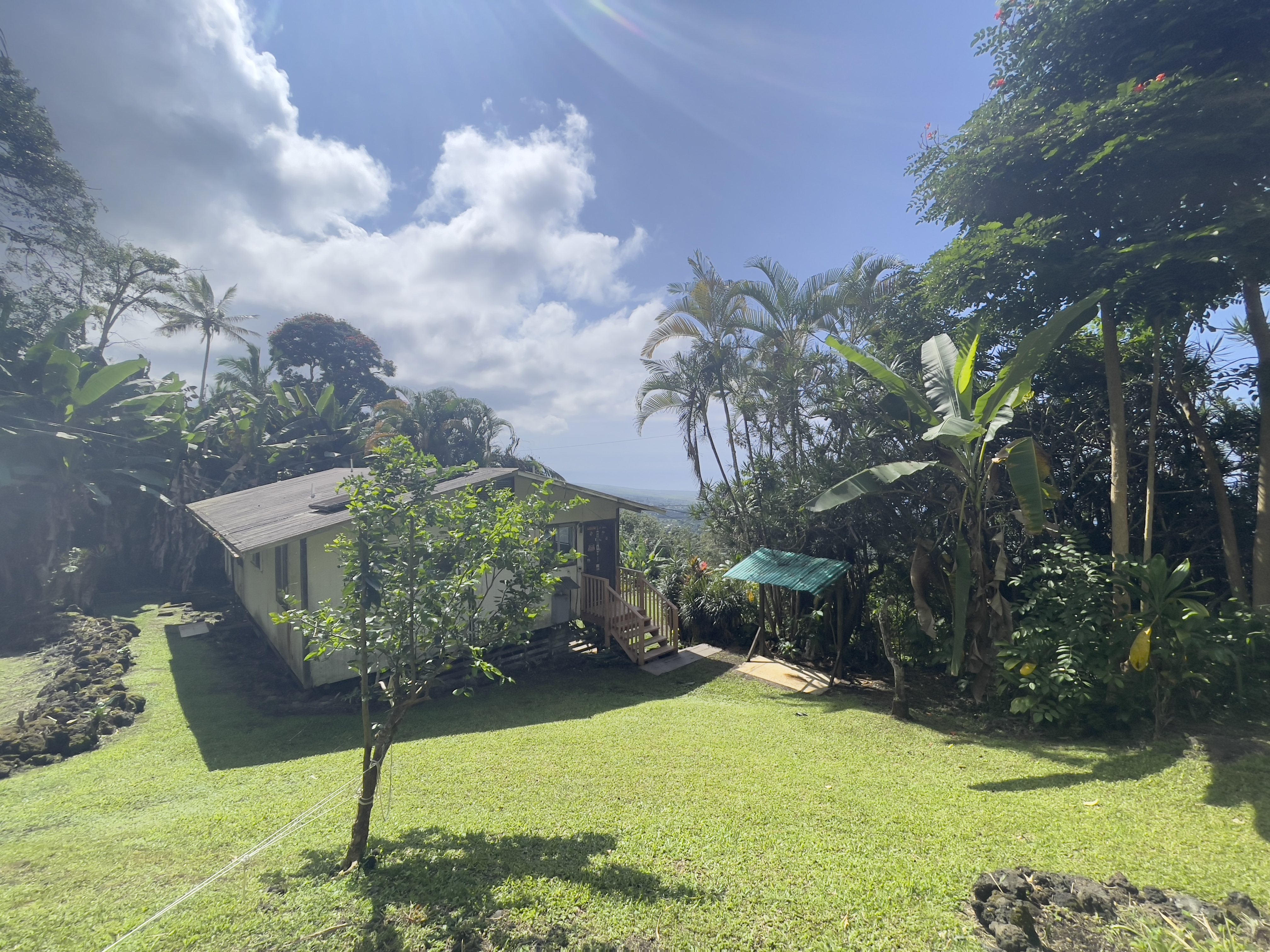 83-5586 Hawaiʻi Belt Road Captain Cook, HI 96704 - Photo 18 of 23 a view of a garden