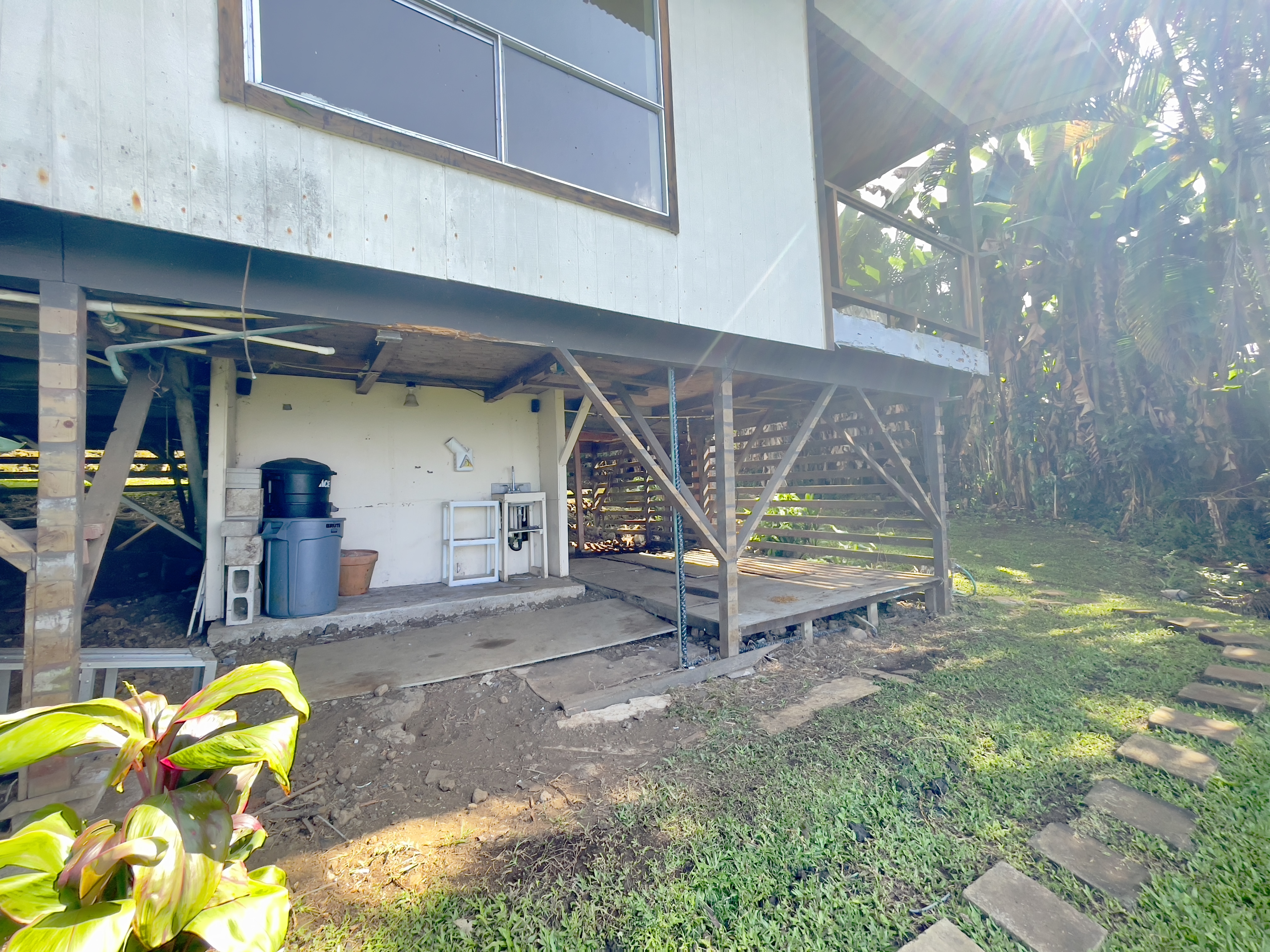 83-5586 Hawaiʻi Belt Road Captain Cook, HI 96704 - Photo 21 of 23 a view of backyard and a play house