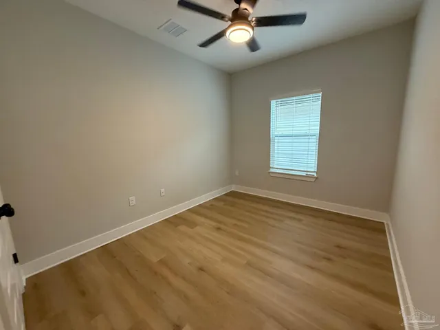 a bathroom with a shower and a tub