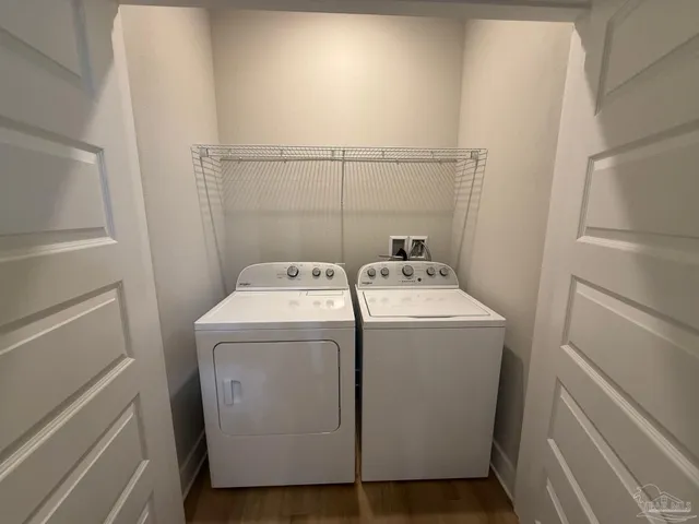 an empty room with a bathroom and a sink