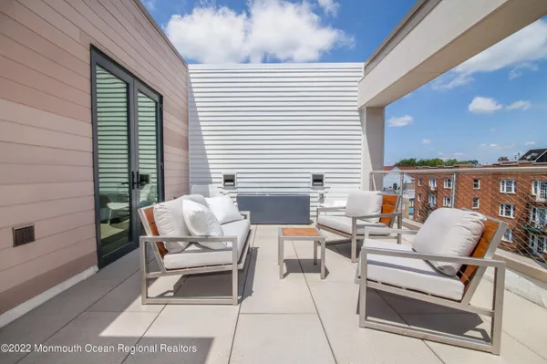 a bathroom with a toilet sink and shower