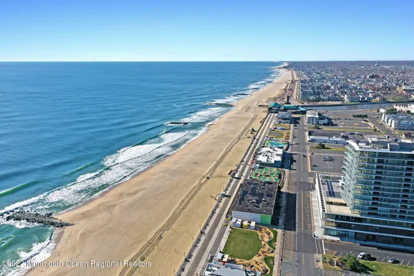 a view of a balcony with table and chairs