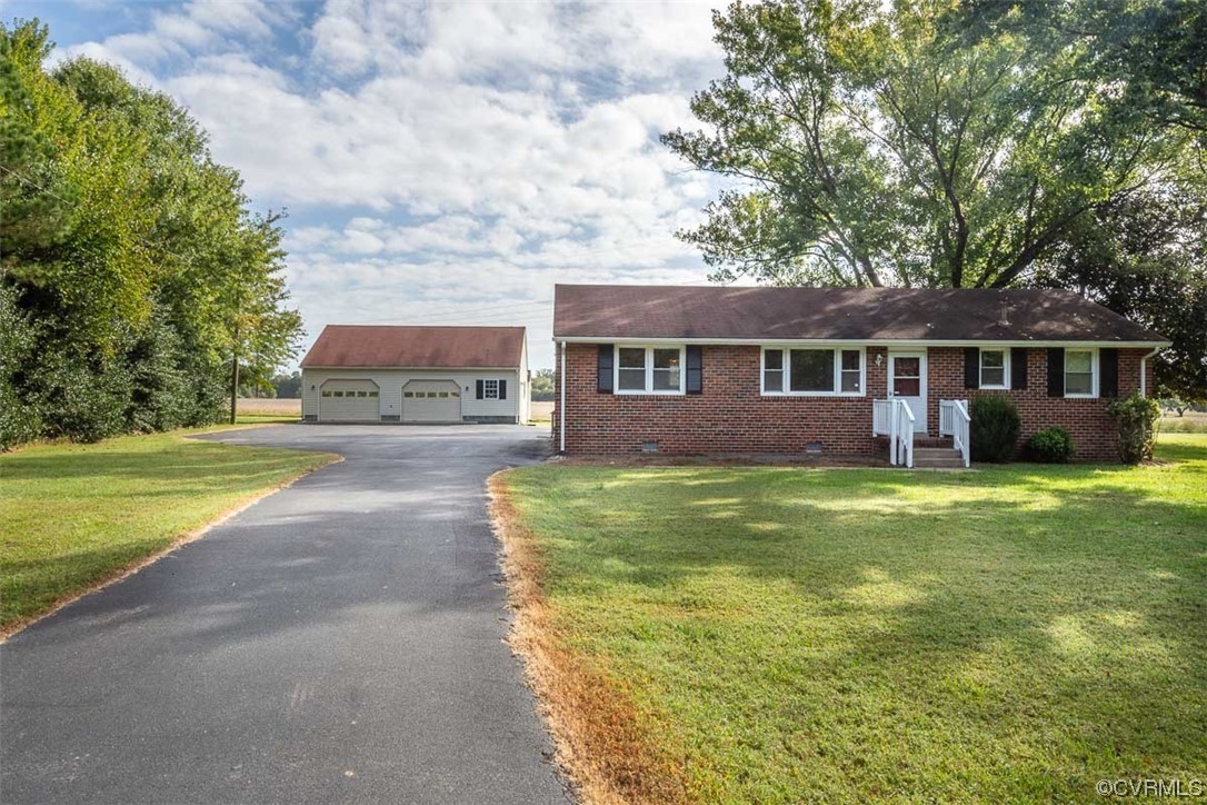 a view of a house with a garden