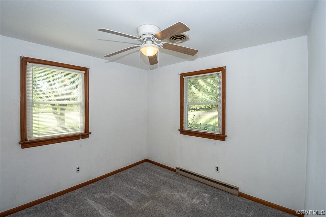 8409 Buffin Road Henrico, VA 23231 - Photo 14 of 22 a view of an empty room with a window