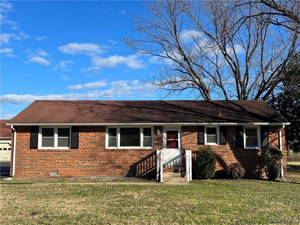 8409 Buffin Road Henrico, VA 23231 - Photo 2 of 22 front view of a house with a yard