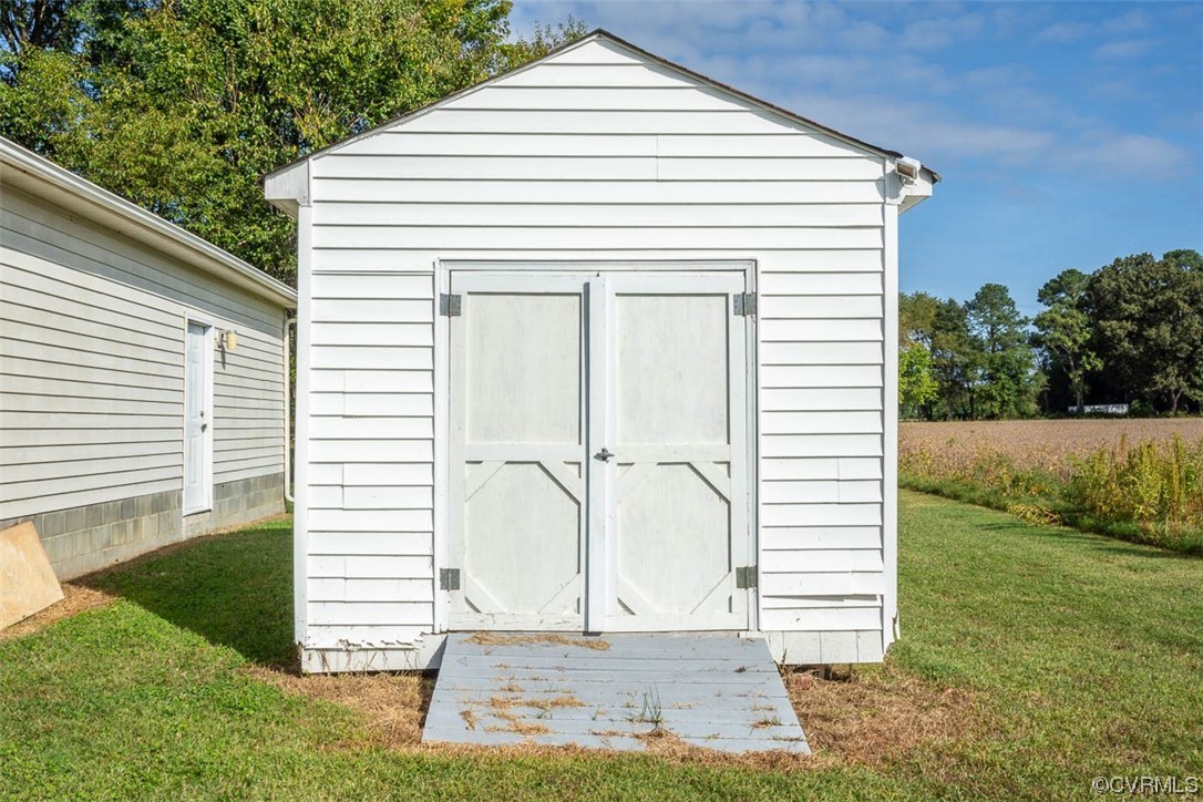 8409 Buffin Road Henrico, VA 23231 - Photo 6 of 22 a view of a house with a yard