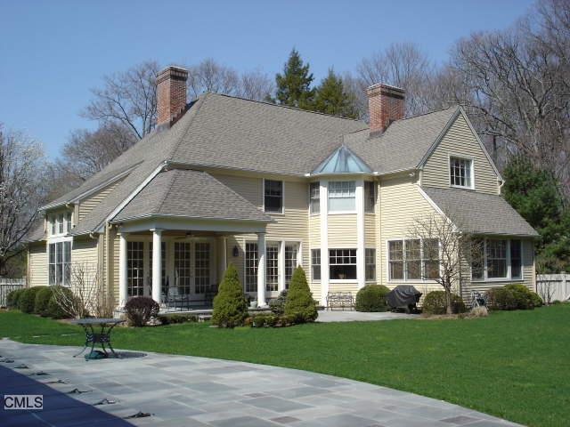 51 Partrick Road Westport, CT 06880 - Photo 1 of 1 a front view of a house with a yard