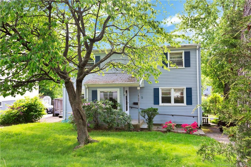 4 Chester Street Norwalk, CT 06850 - Photo 1 of 1 a front view of house with yard and green space