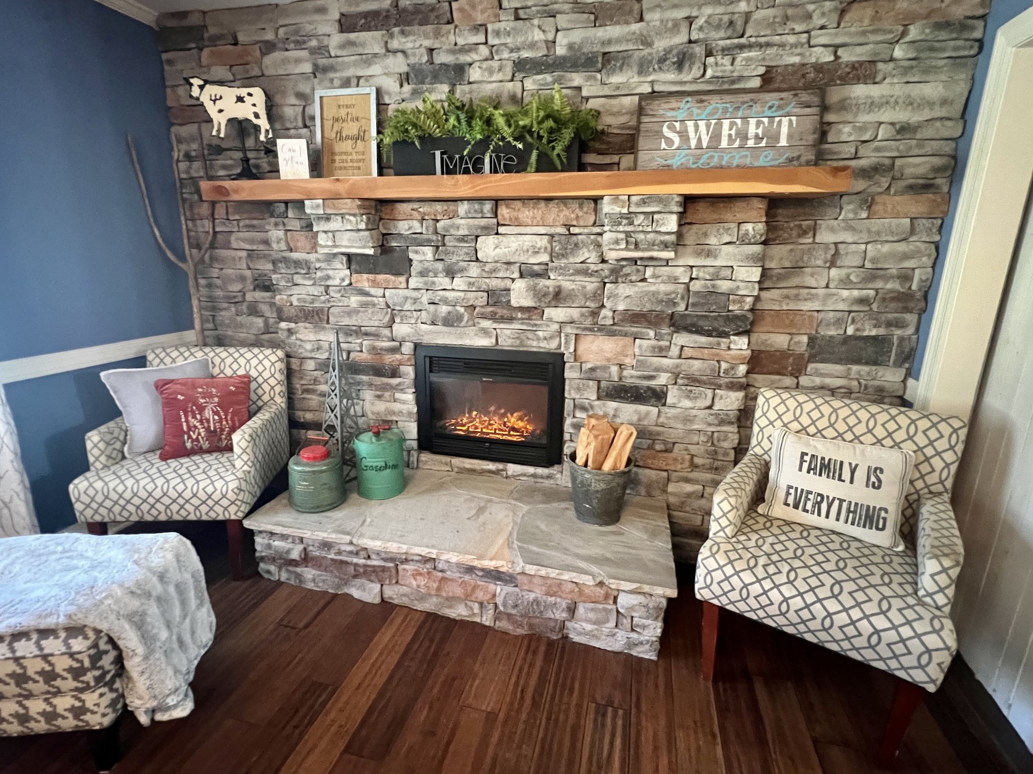3565 Cedar Grove Road Lebanon, TN 37087 - Photo 8 of 64 Beautiful stone with electric fireplace. It can have just the log feature or also turns on the have heat