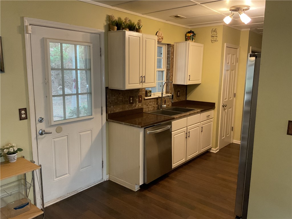 229 Cub Cove Drive Walhalla, SC 29691 - Photo 14 of 50 This functional kitchen features ample cabinet space and modern appliances, perfect for daily living.