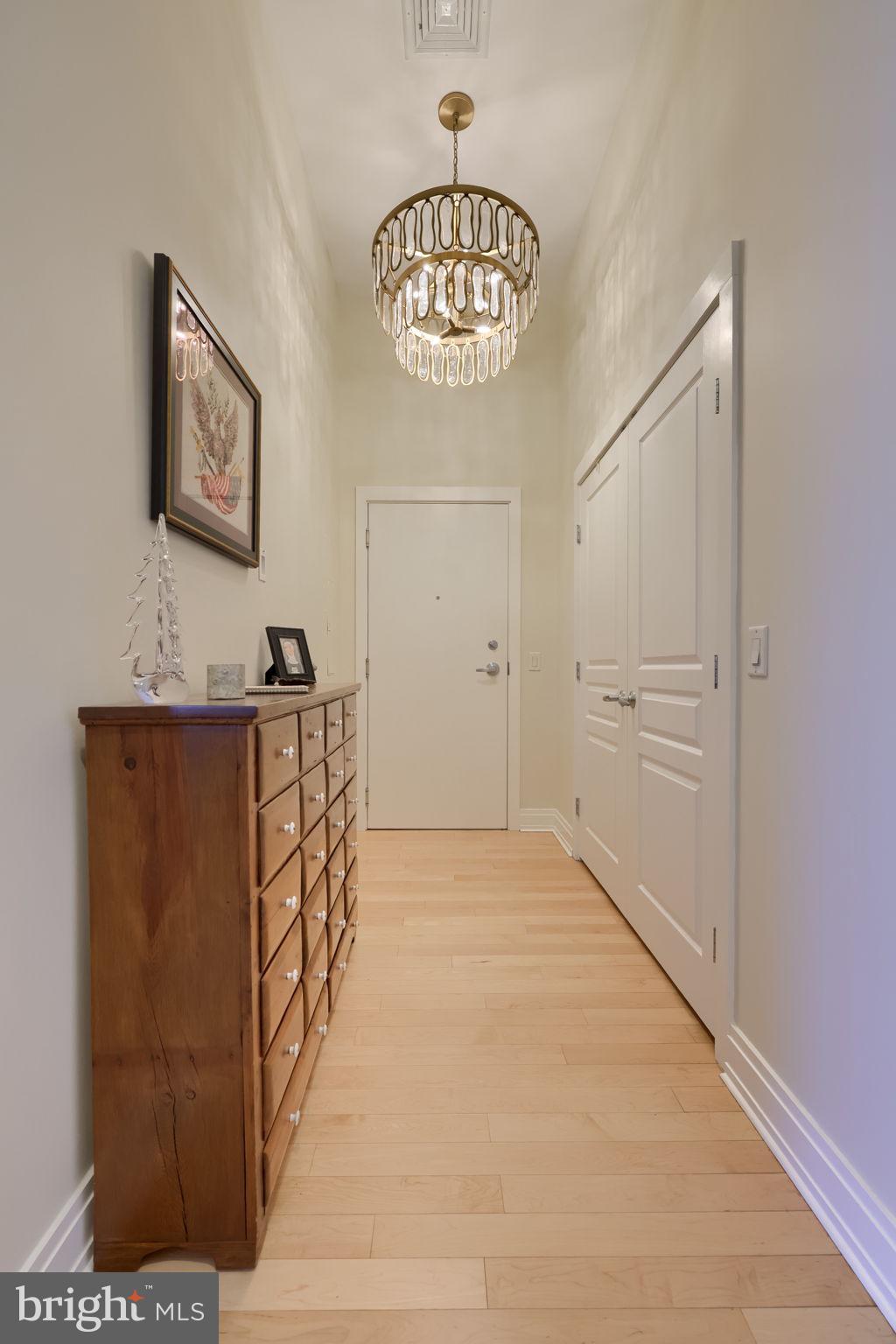 41 West Lemon Street, Unit 210 Lancaster, PA 17603 - Photo 4 of 43 a view of a hallway with a chandelier