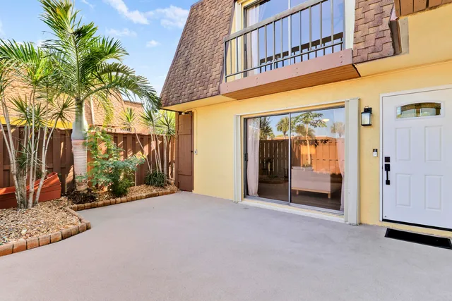 a view of a building with a yard