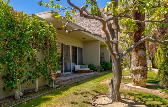 a view of a house with swimming pool
