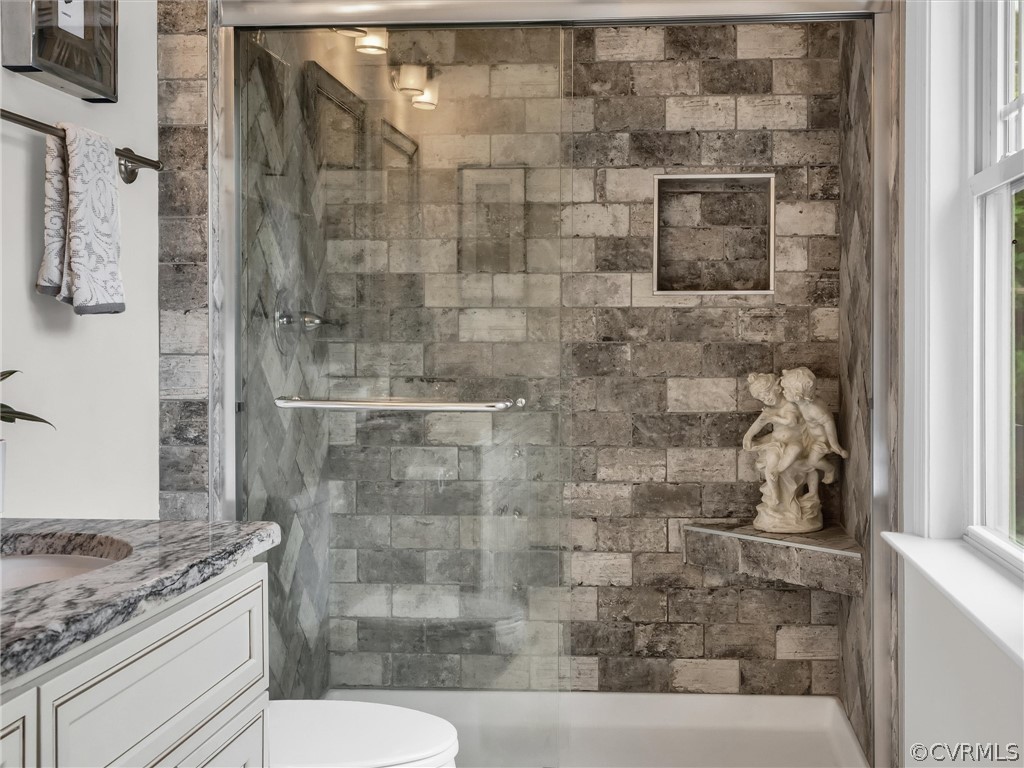 3249 Ludgate Road Chester, VA 23831 - Photo 18 of 34 a bathroom with a toilet and a shower