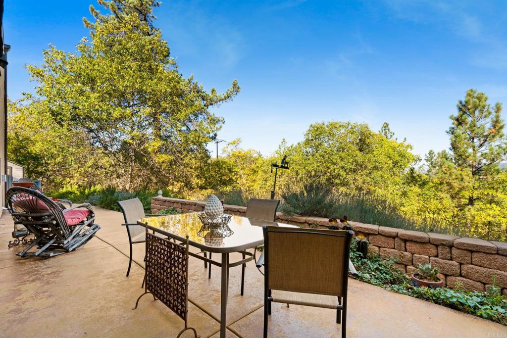 2810 3 Peaks Lane Julian, CA 92036 - Photo 14 of 54 a view of a chairs and table in the balcony