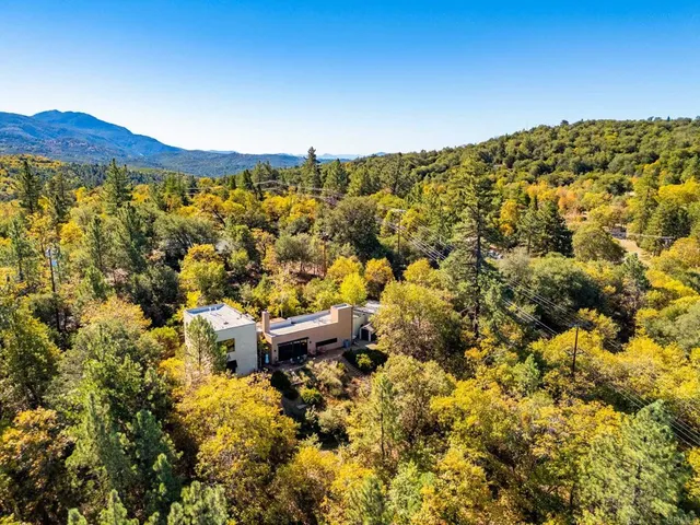 a view of a house with a mountain