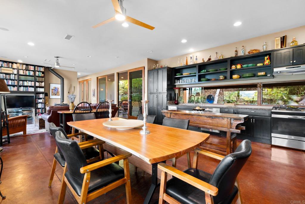 2810 3 Peaks Lane Julian, CA 92036 - Photo 21 of 54 a group of dining room with furniture and wooden floor