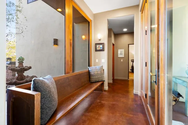 a en suite bathroom with a double vanity sink and a mirror
