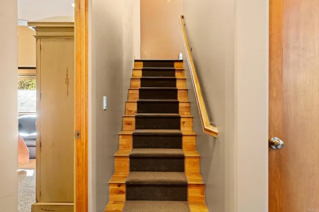 a view of a large building with a mountain in the background