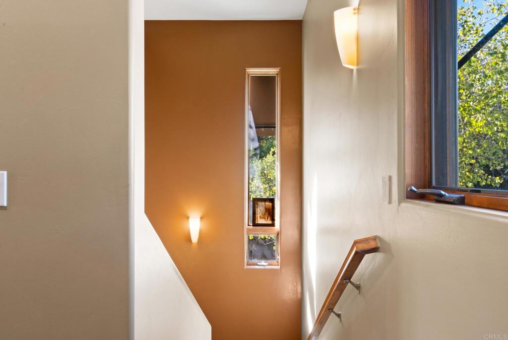 2810 3 Peaks Lane Julian, CA 92036 - Photo 40 of 54 a view of a hallway with windows