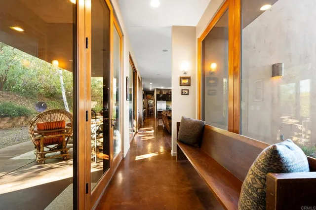 a living room with fireplace furniture and a flat screen tv