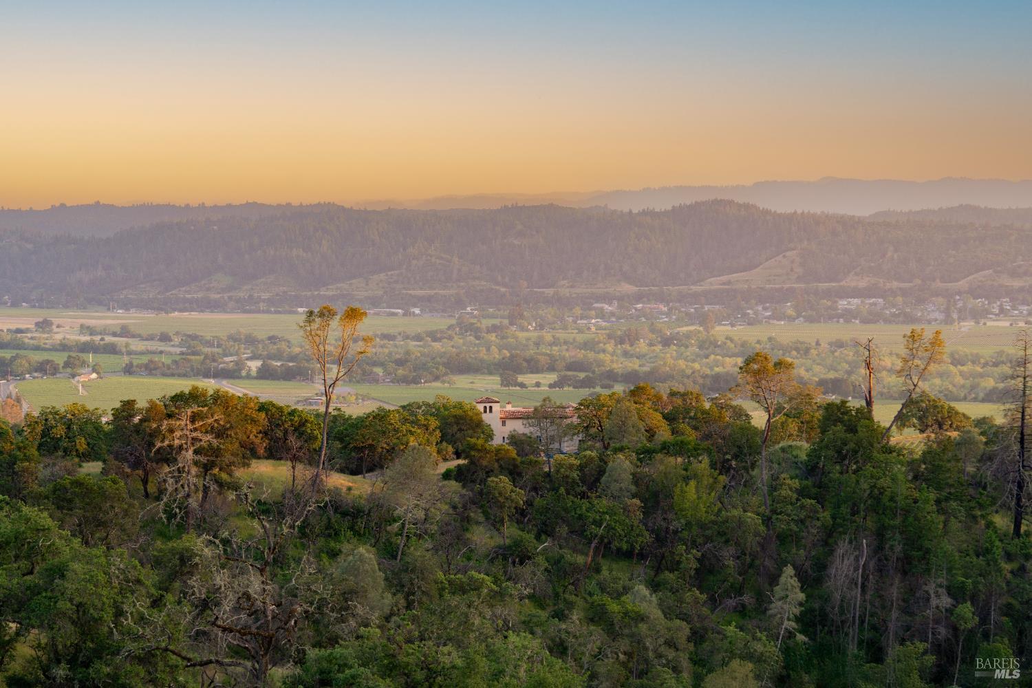 21350 River Road Geyserville, CA 95441 - Photo 13 of 15 a view of a city with mountains in the background