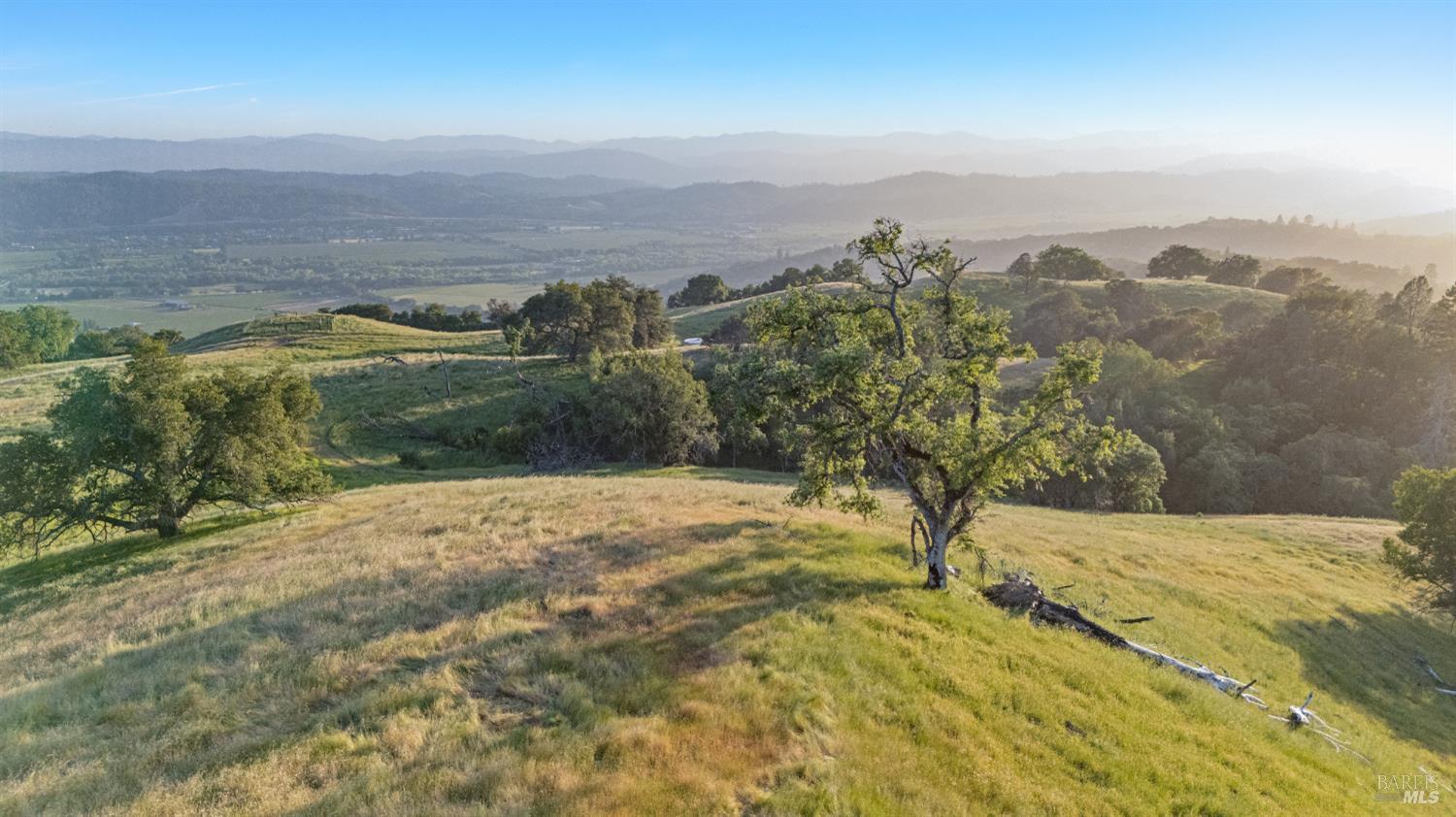 21350 River Road Geyserville, CA 95441 - Photo 3 of 15 a view of a lake with a mountain