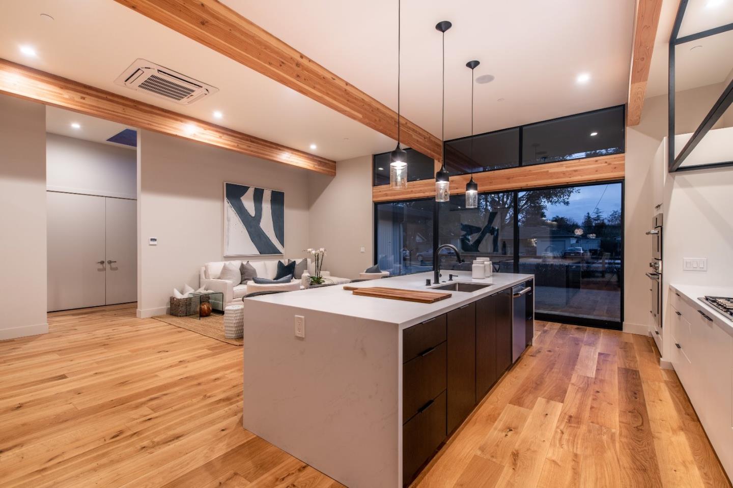 667 Springer Terrace Los Altos, CA 94024 - Photo 17 of 36 a kitchen with a stove and a wooden floor