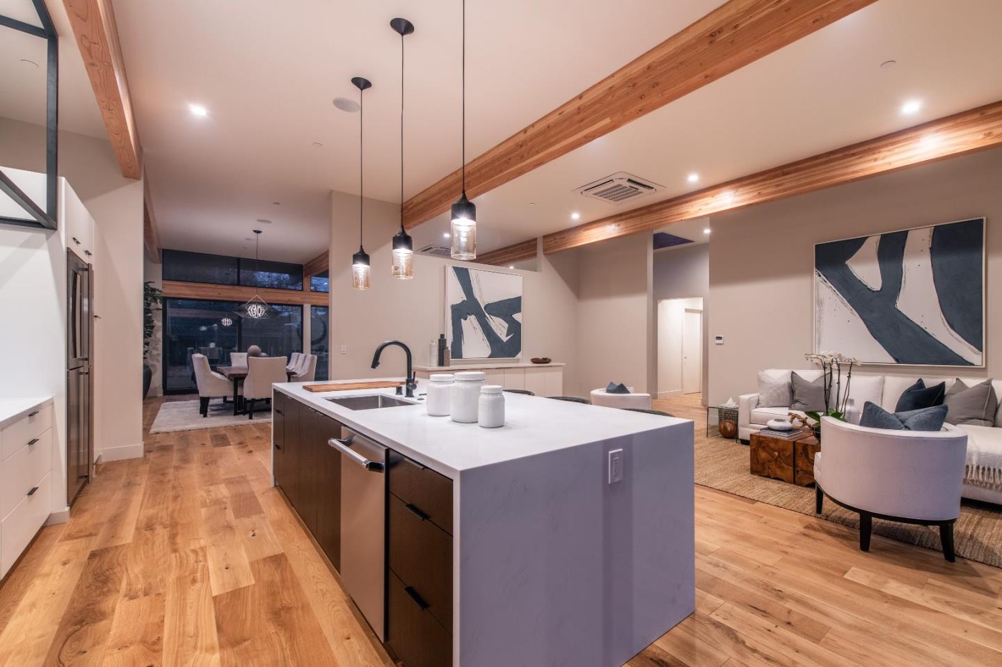 667 Springer Terrace Los Altos, CA 94024 - Photo 19 of 36 a large kitchen with a counter space a sink stainless steel appliances and cabinets