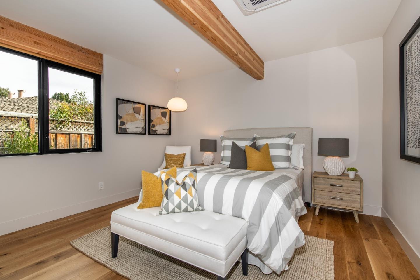 667 Springer Terrace Los Altos, CA 94024 - Photo 23 of 36 a bedroom with a bed and a large window