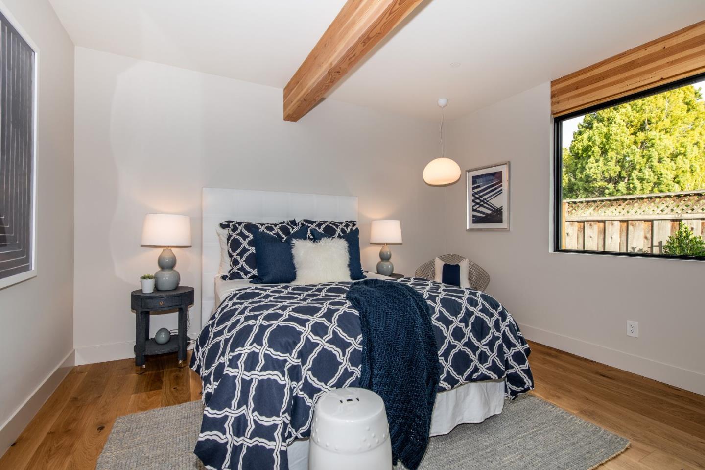 667 Springer Terrace Los Altos, CA 94024 - Photo 24 of 36 a bedroom with a bed and a window