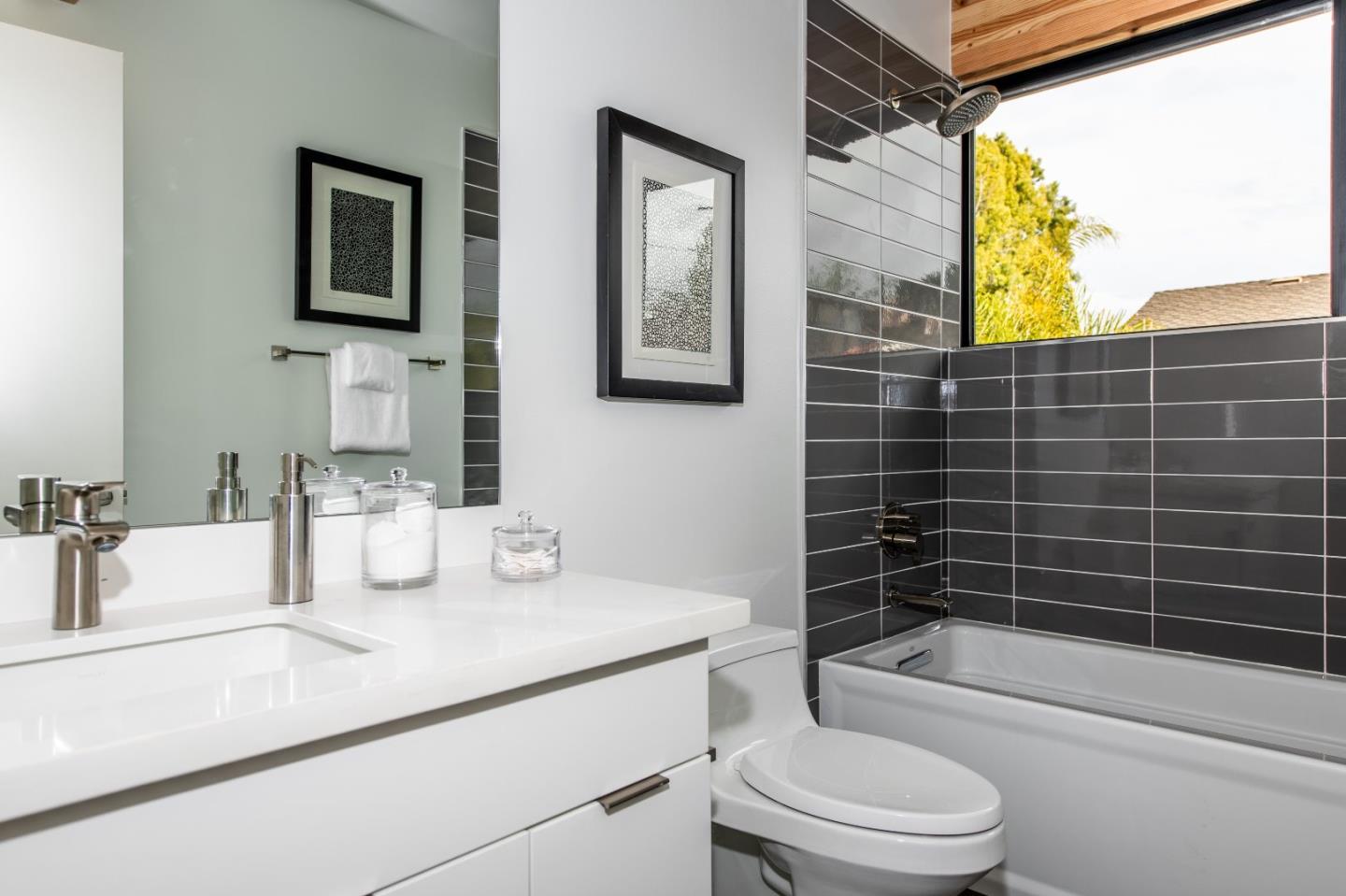 667 Springer Terrace Los Altos, CA 94024 - Photo 25 of 36 a bathroom with a sink a toilet and shower