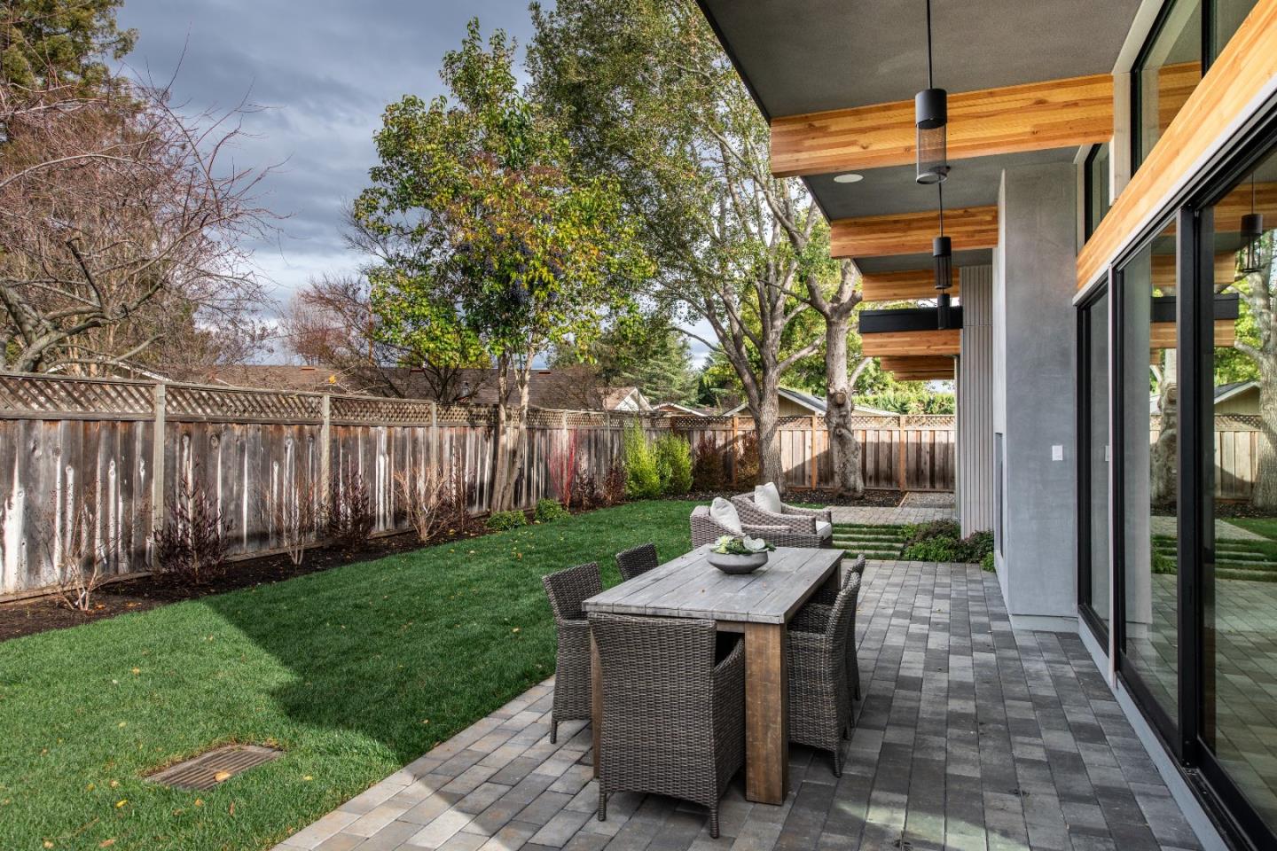 667 Springer Terrace Los Altos, CA 94024 - Photo 29 of 36 a backyard of a house with table and chairs