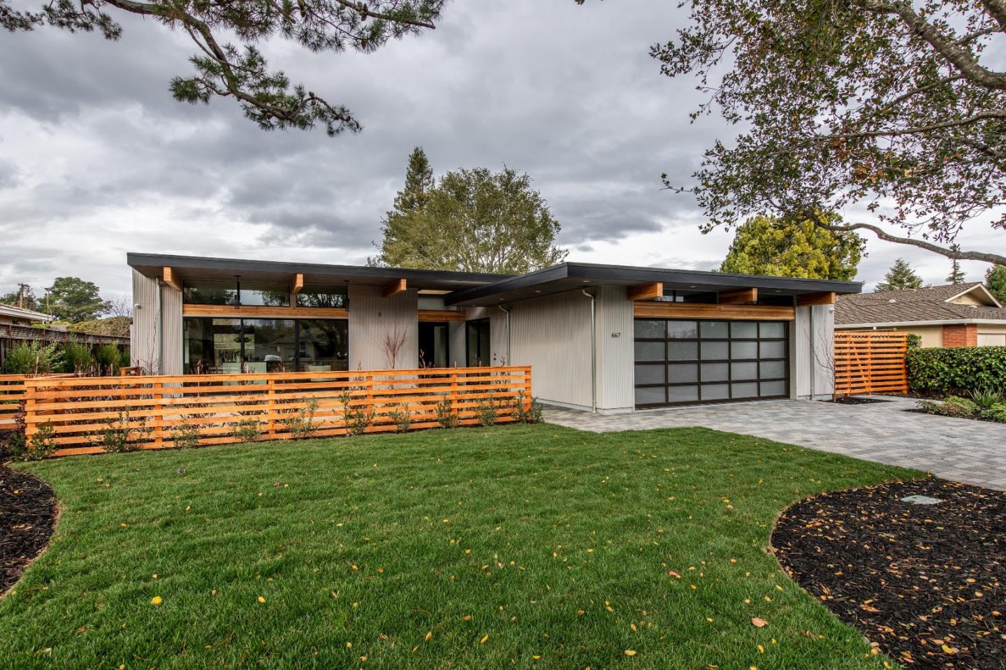 667 Springer Terrace Los Altos, CA 94024 - Photo 3 of 36 a front view of a house with a garden