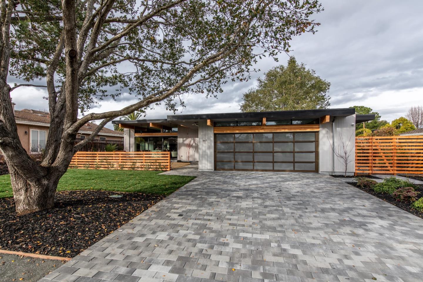 667 Springer Terrace Los Altos, CA 94024 - Photo 5 of 36 a front view of a house with garden