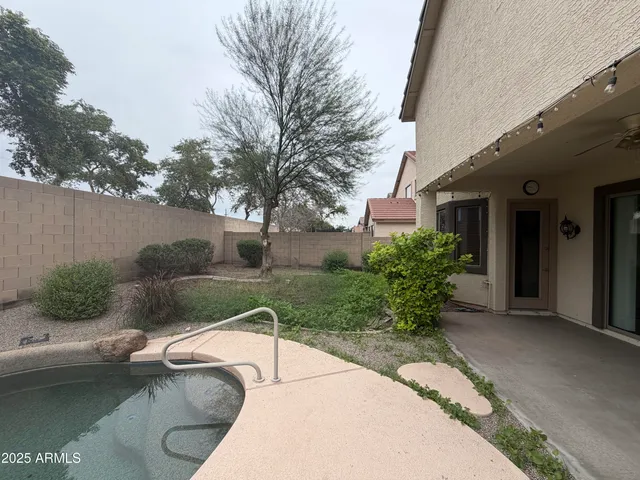a view of a house with a patio