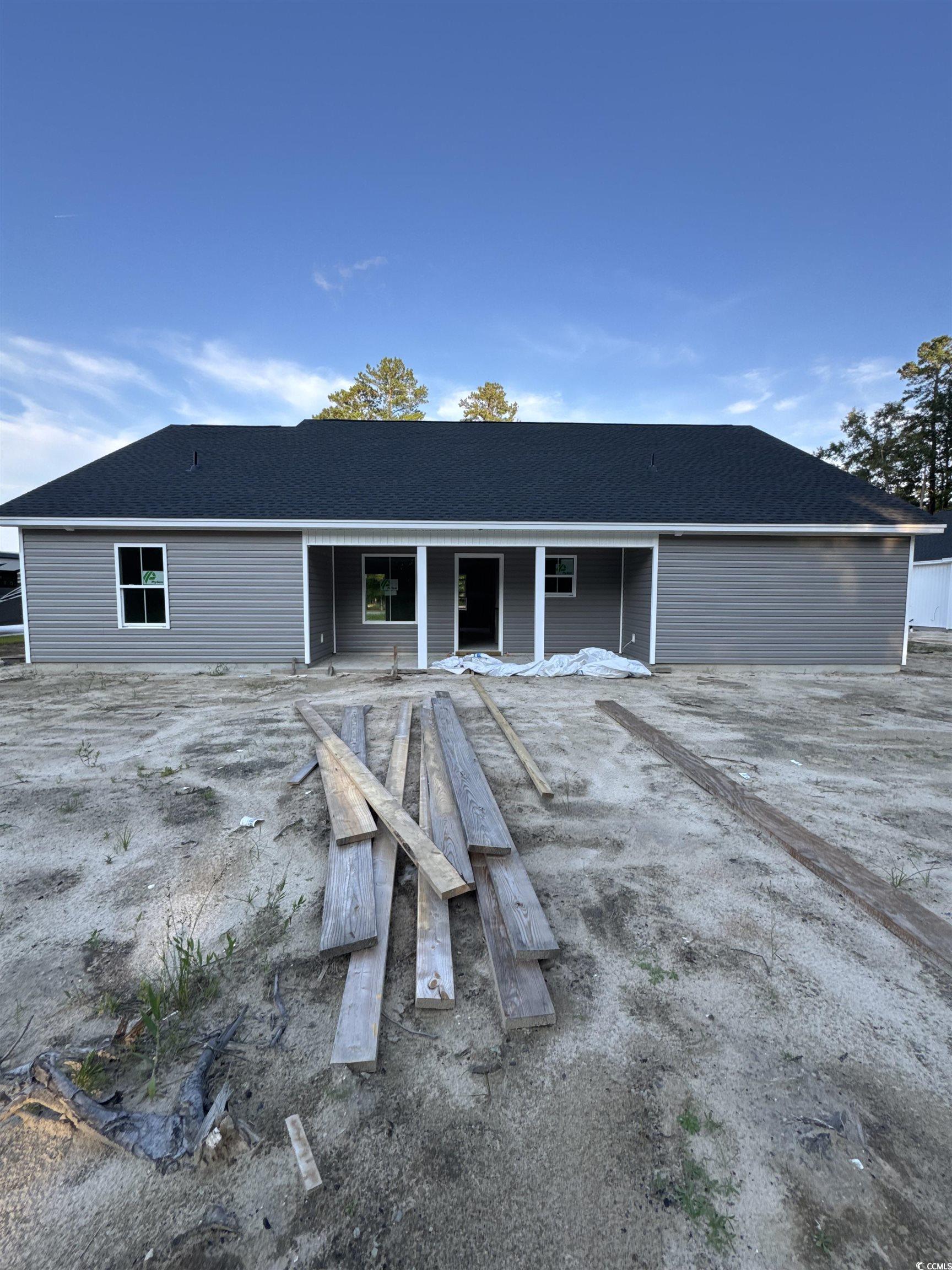 4028 Copperhead Road Conway, SC 29527 - Photo 3 of 4 Rear view of house featuring covered porch and a shingled roof