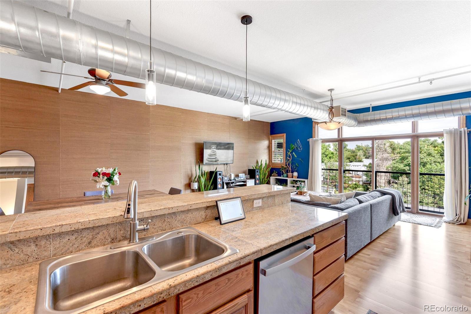 3299 Lowell Boulevard, Unit 302 Denver, CO 80211 - Photo 24 of 50 a kitchen with a sink and a large window
