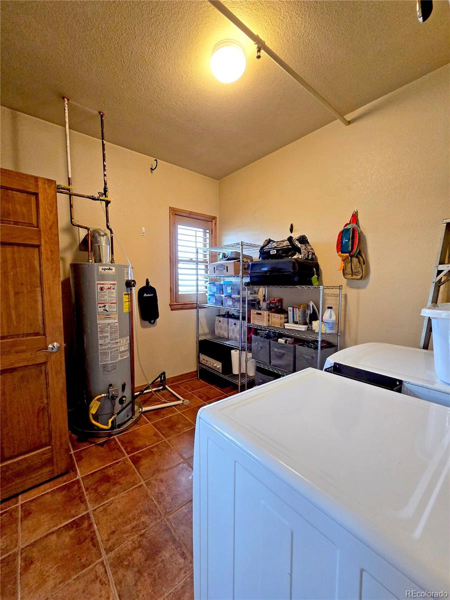 3299 Lowell Boulevard, Unit 302 Denver, CO 80211 - Photo 33 of 50 a room with gym equipment and a window