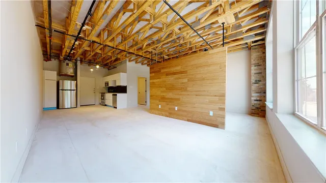 an empty room with windows