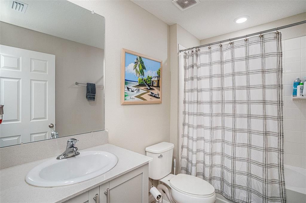 12940 Hawkstone Trail Boulevard Lithia, FL 33547 - Photo 17 of 33 a bathroom with a sink toilet and shower