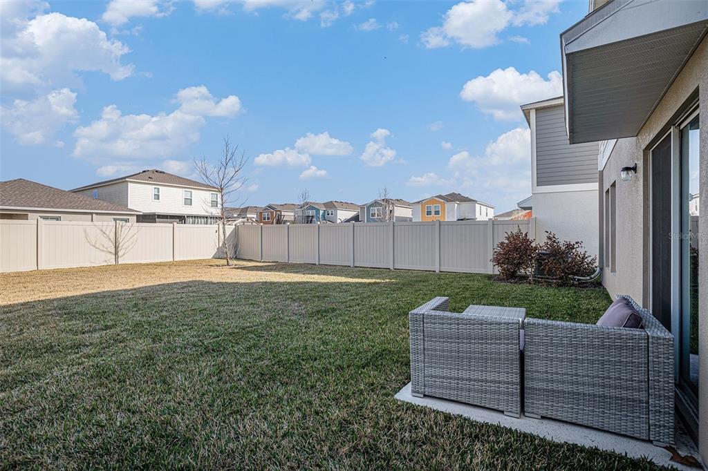 12940 Hawkstone Trail Boulevard Lithia, FL 33547 - Photo 21 of 33 a view of a house with a yard
