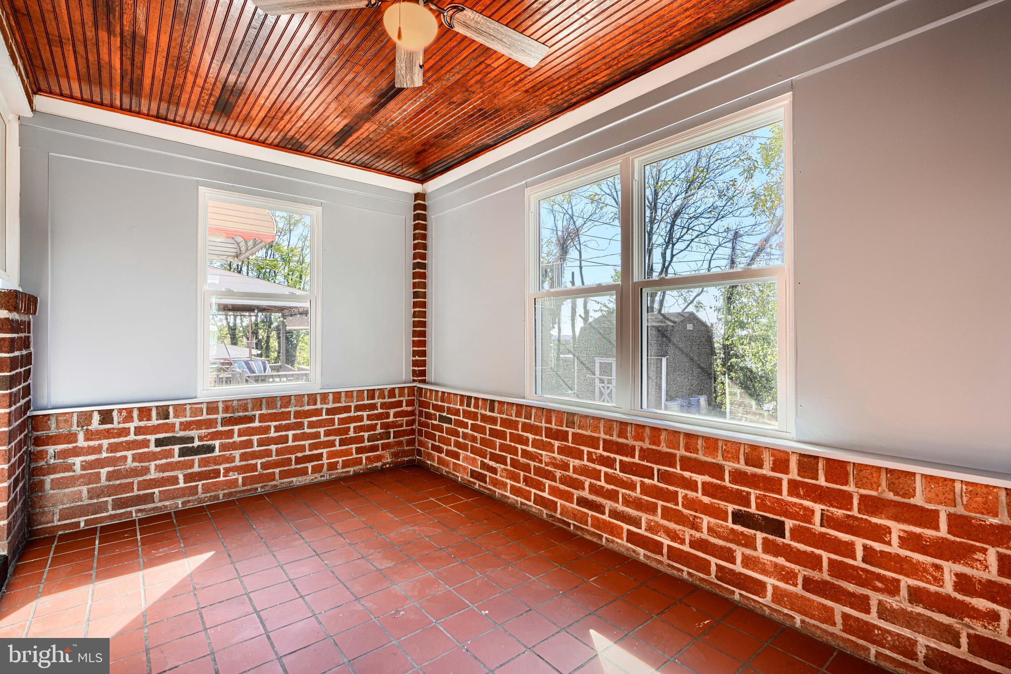 644 48th Street Baltimore, MD 21224 - Photo 15 of 37 a view of an empty room with windows