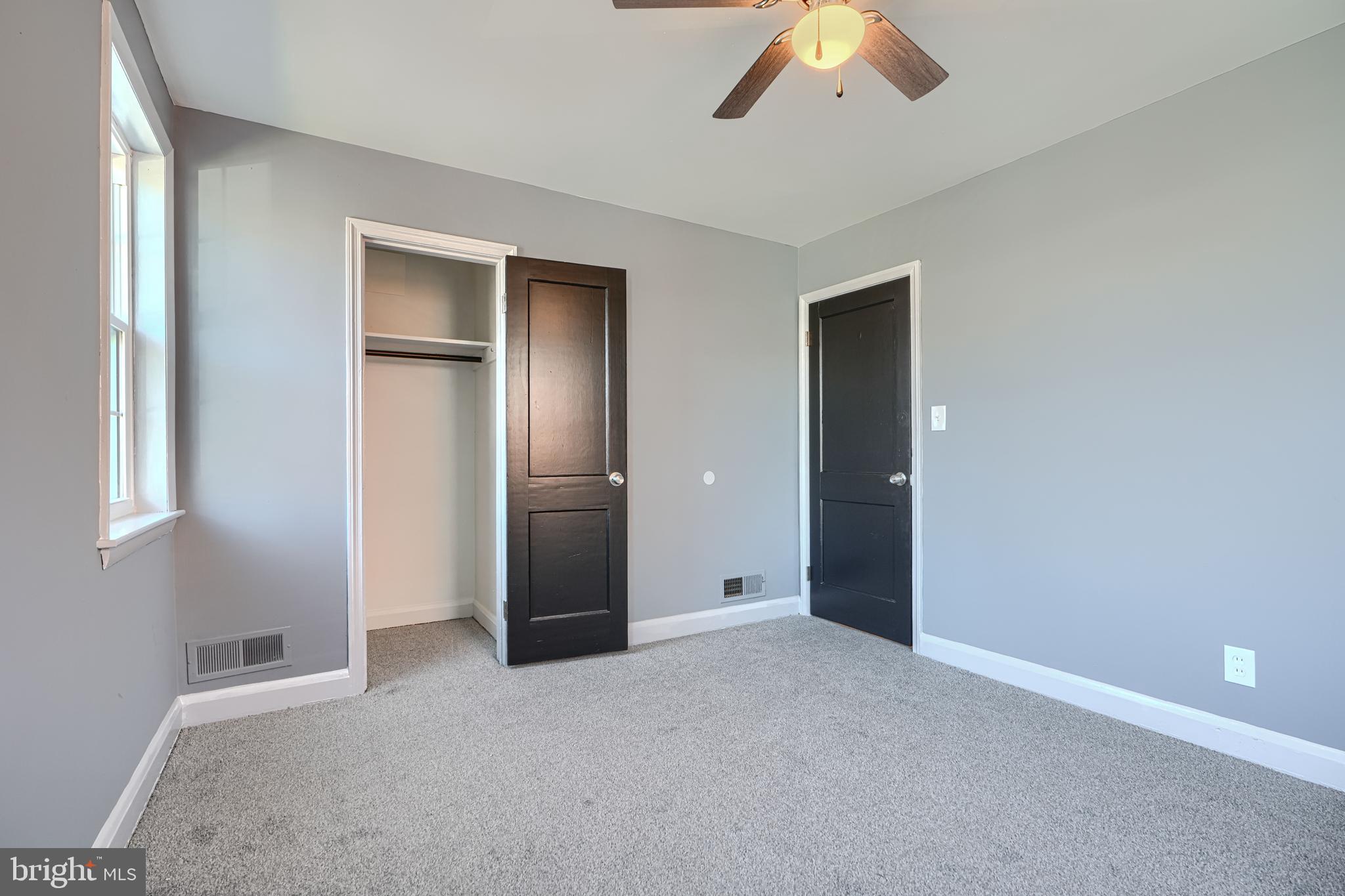 644 48th Street Baltimore, MD 21224 - Photo 19 of 37 an empty room with closet and windows