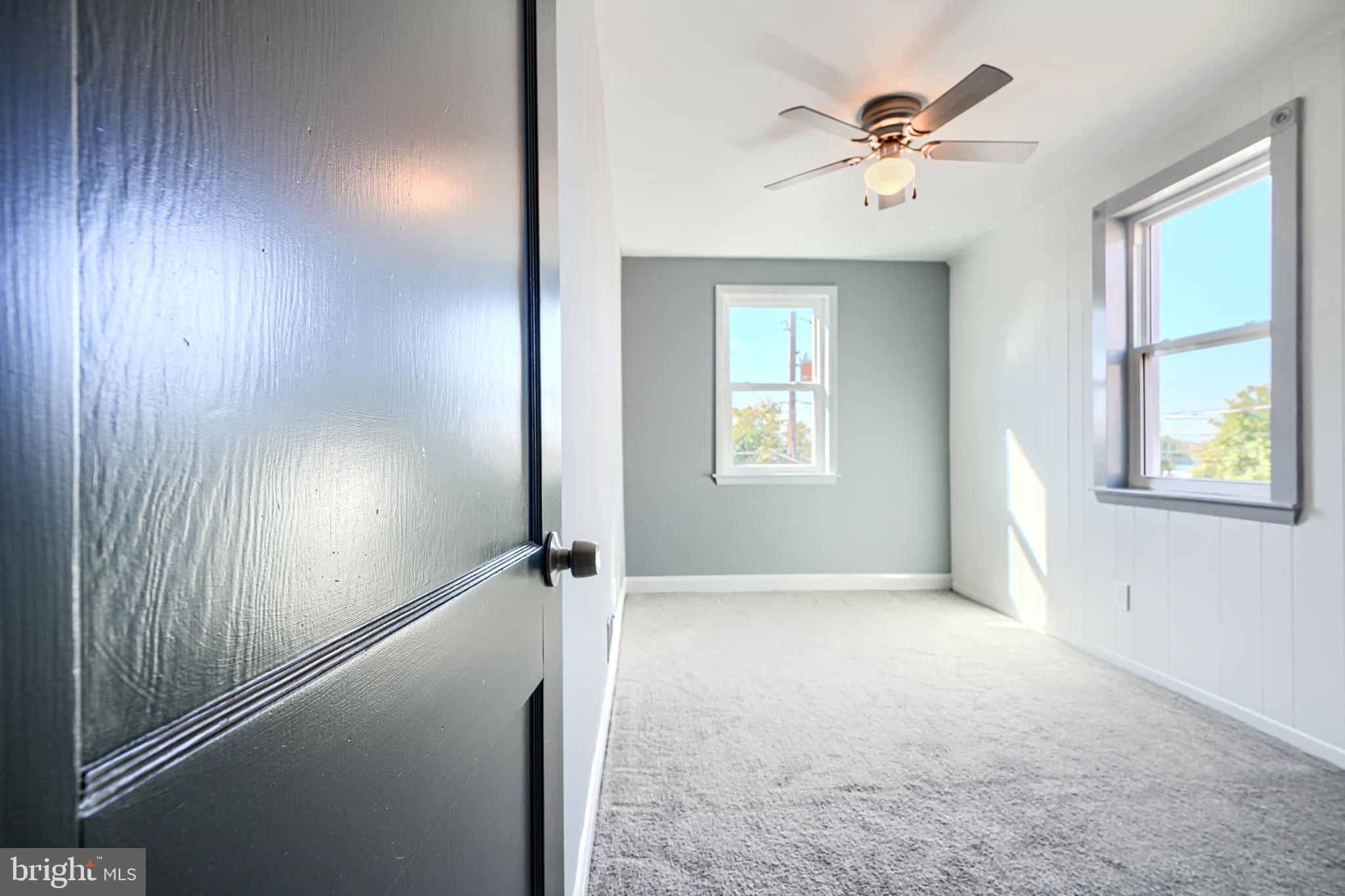 644 48th Street Baltimore, MD 21224 - Photo 20 of 37 an empty room with windows and closet