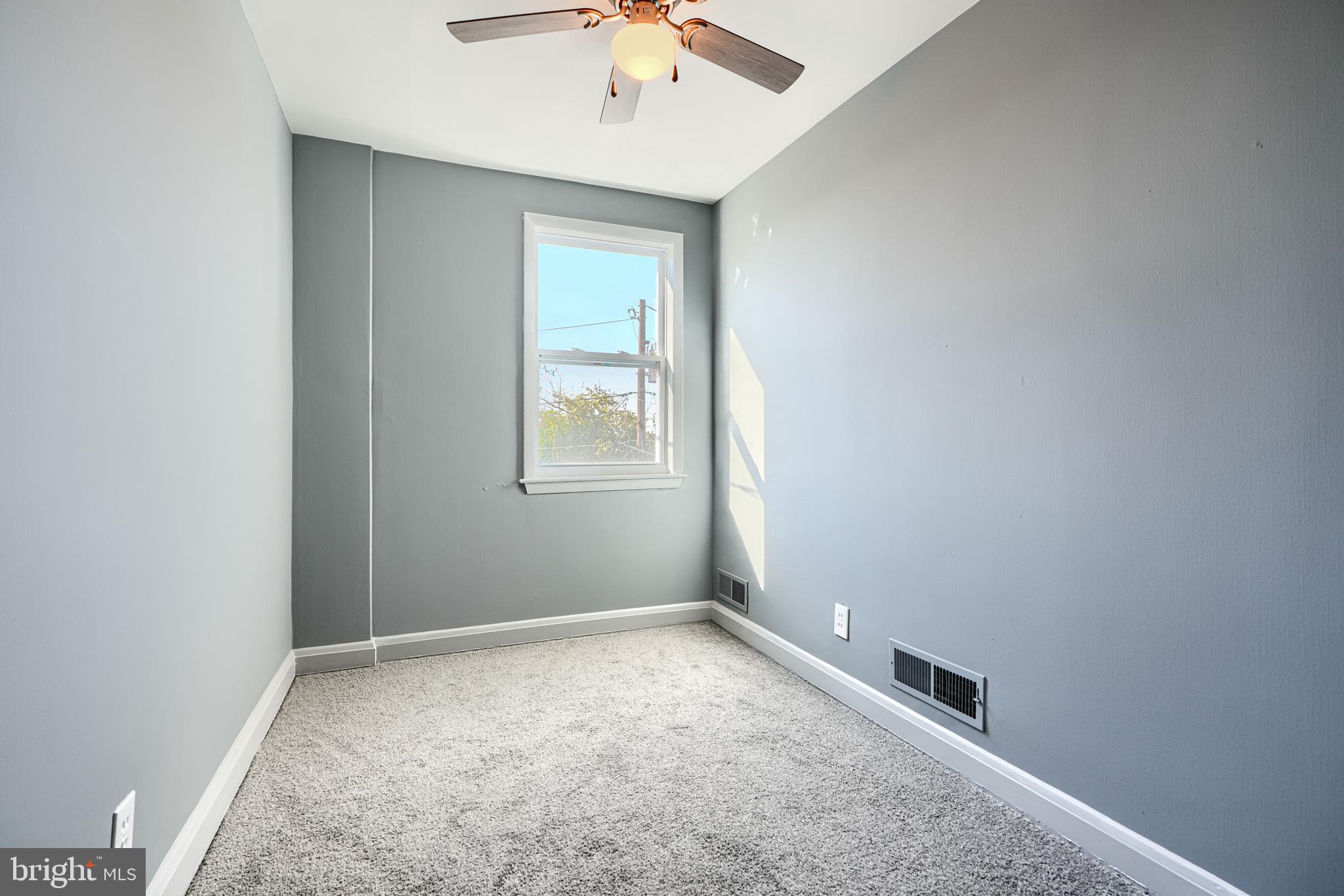 644 48th Street Baltimore, MD 21224 - Photo 24 of 37 an empty room with a window