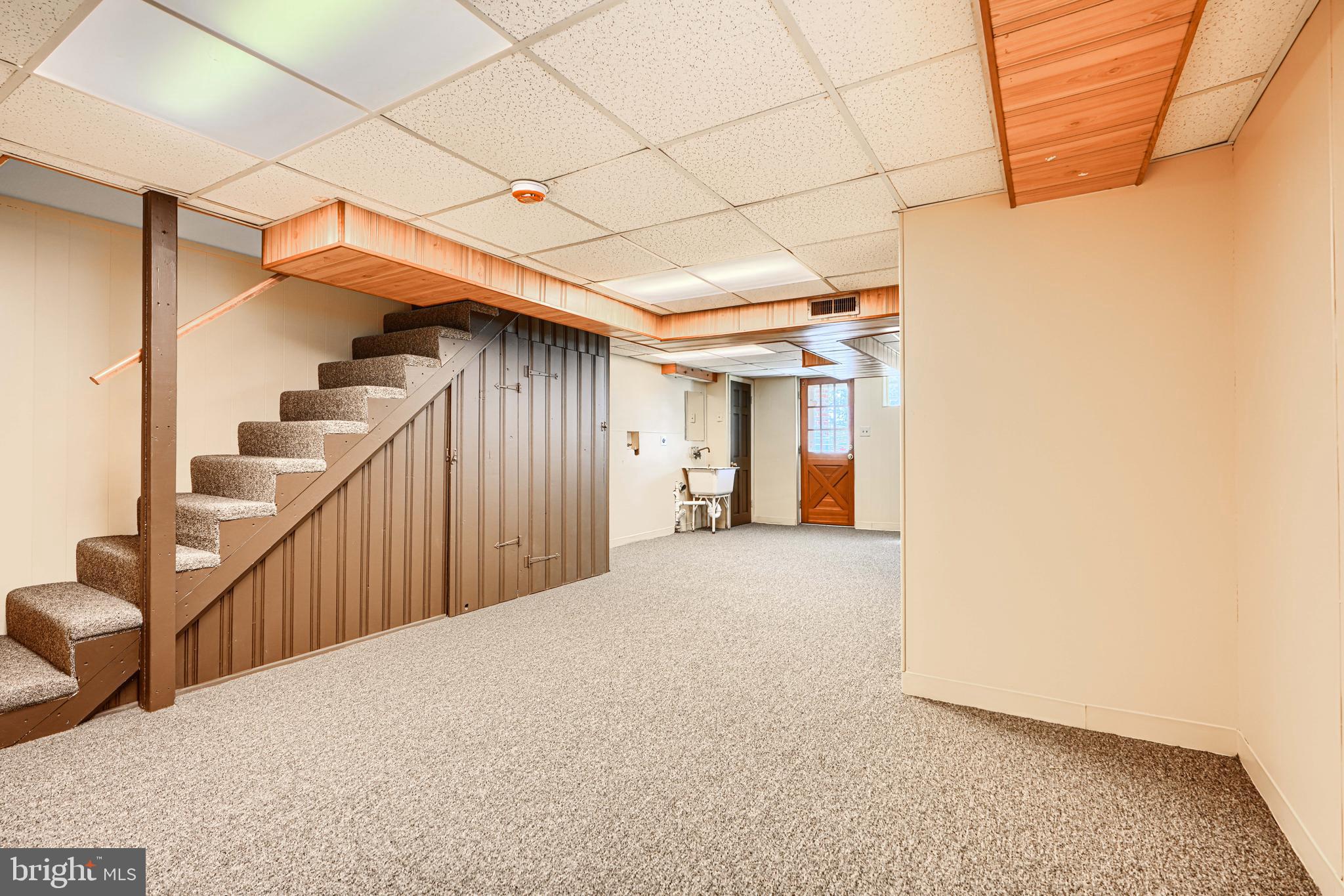 644 48th Street Baltimore, MD 21224 - Photo 32 of 37 a view of a hallway with stairs
