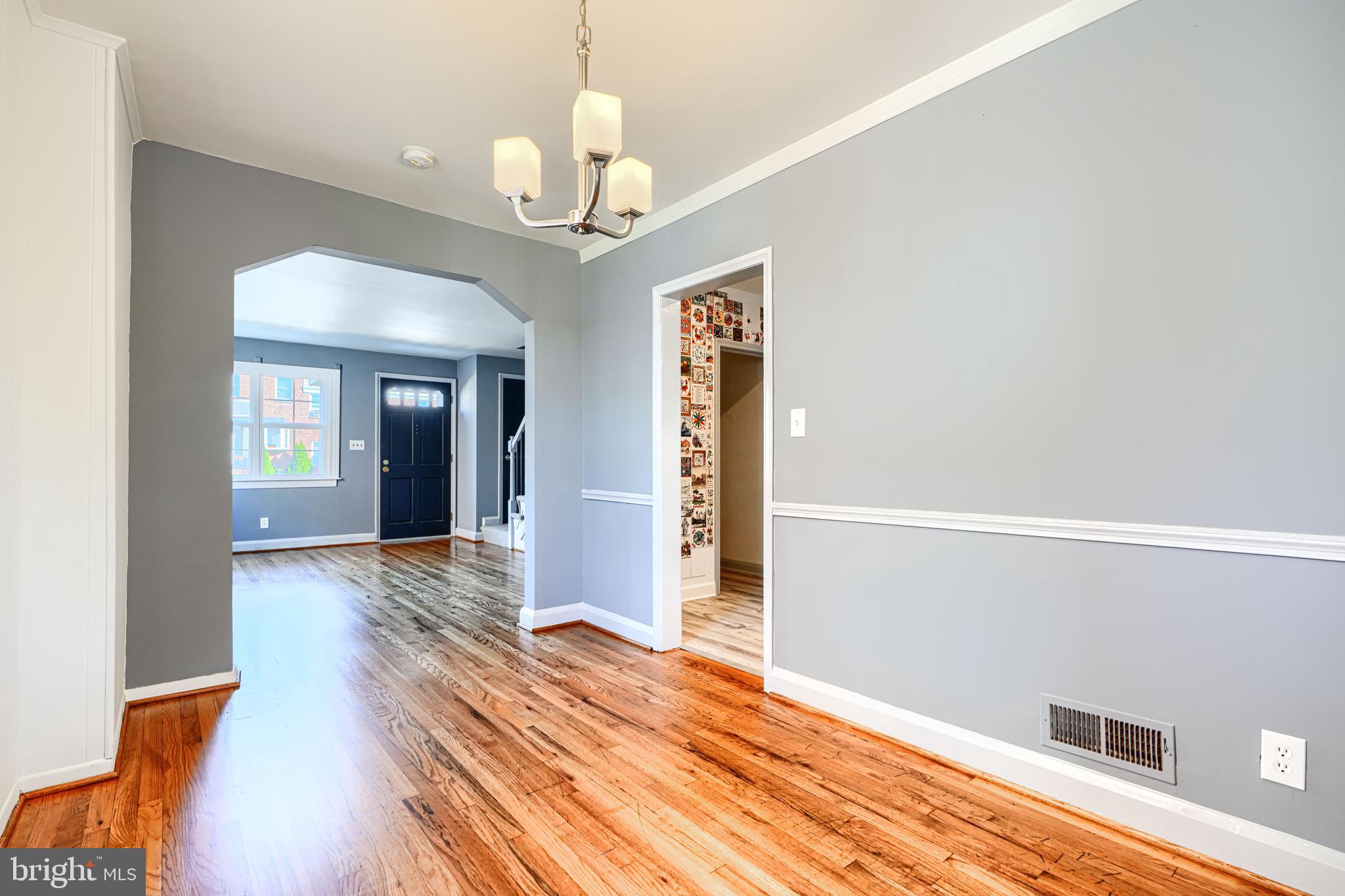 644 48th Street Baltimore, MD 21224 - Photo 9 of 37 a view of a livingroom with wooden floor
