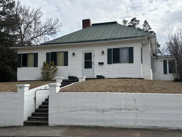 a front view of house with yard
