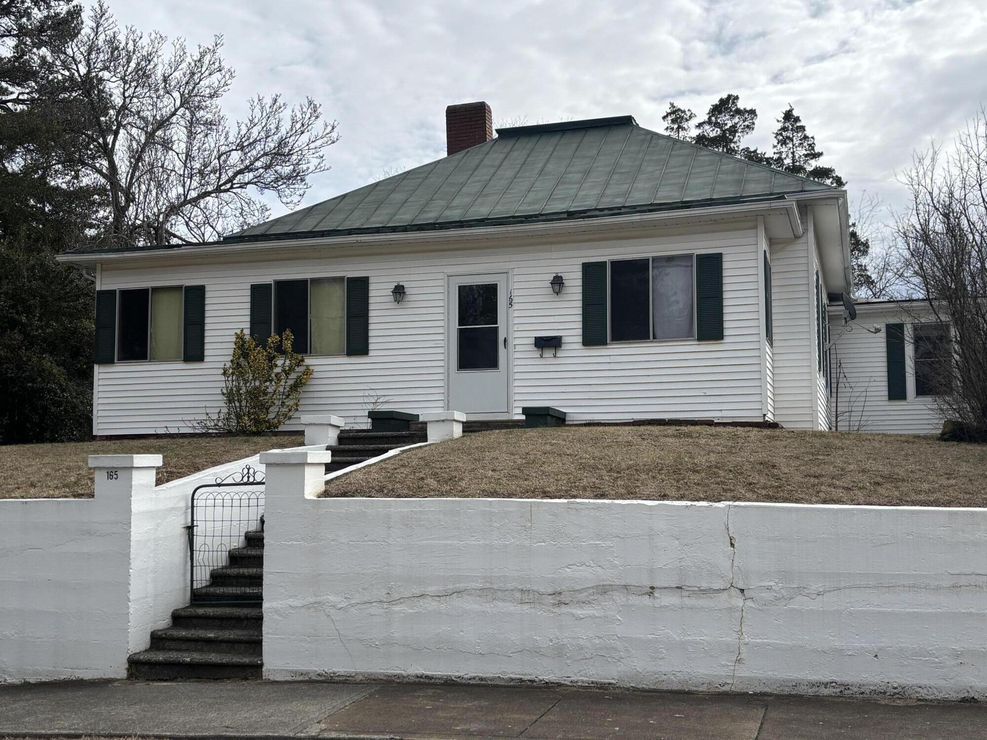 165 West College Street Rocky Mount, VA 24151 - Photo 1 of 24 a front view of house with yard